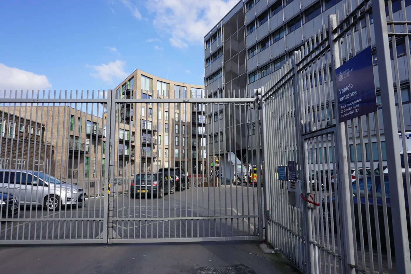 The Camden Street car park and vehicle gate of Shirley House, 25 Camden Road, when it was British Transport Police headquarters. A new six-storey wing would be built on the car park.